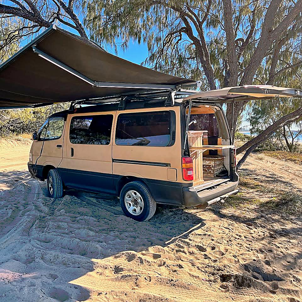 Archi 4X4 at the beach — awning extended