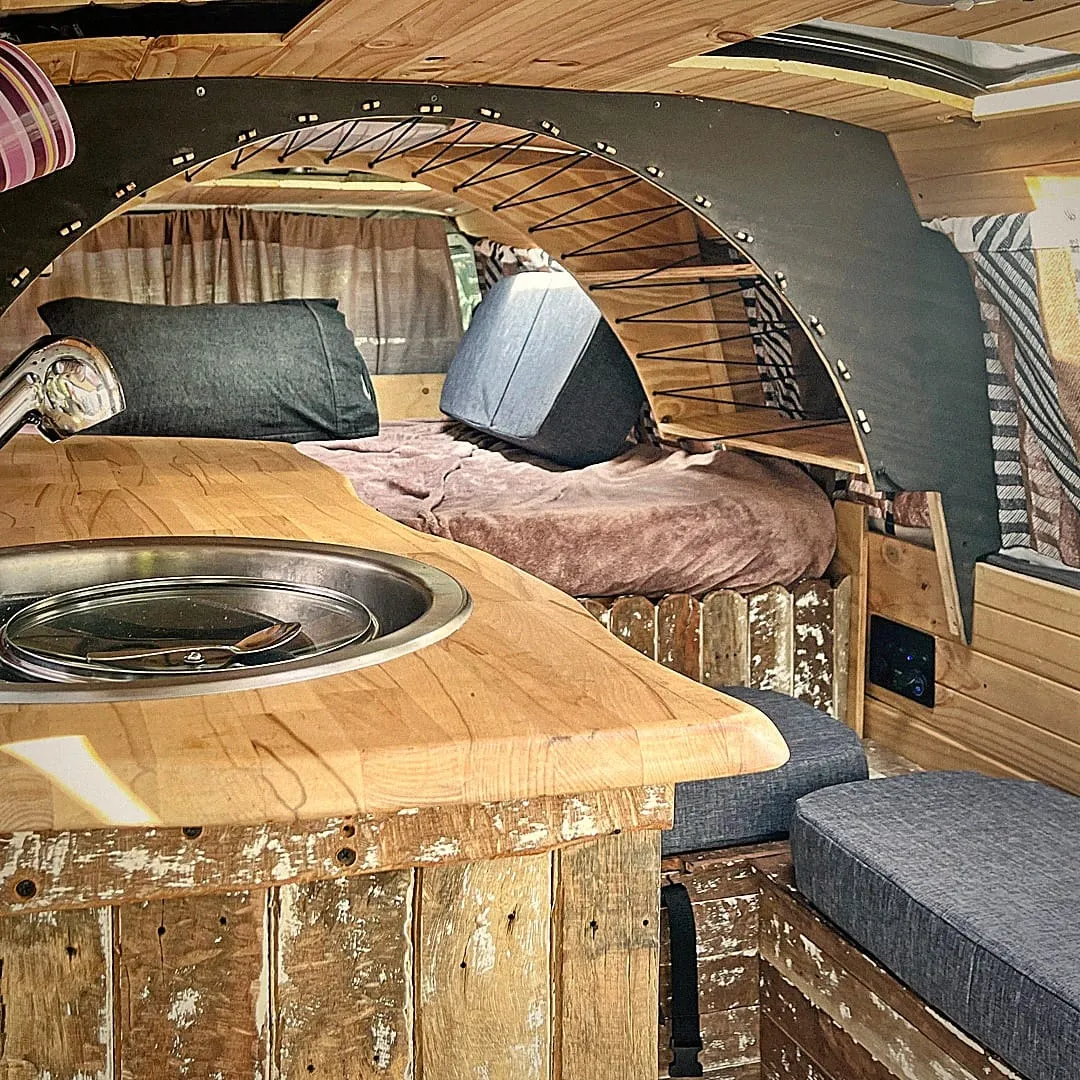 Interior — kitchen bench and sleeping area