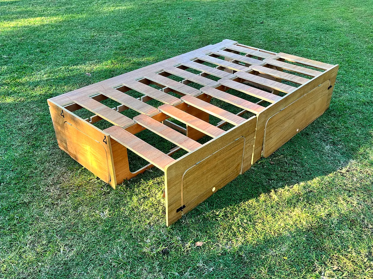 Comb bed extended — side view from the foot end