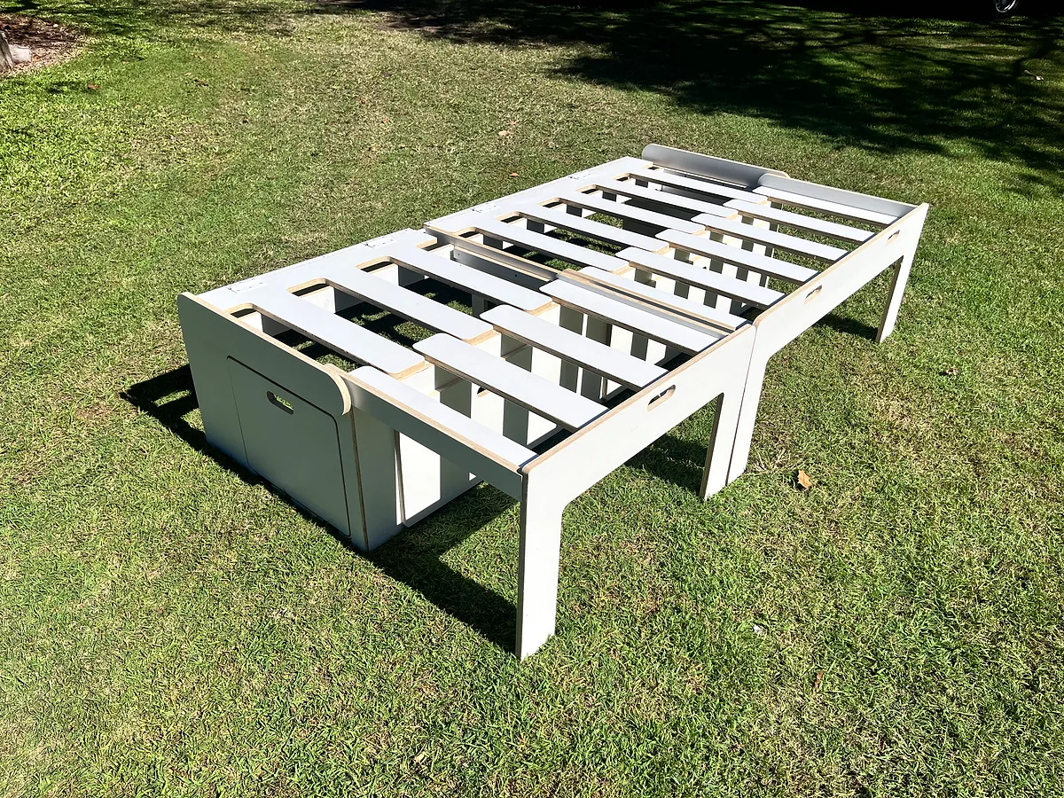 White comb bed extended into full sleeping platform — slat base visible