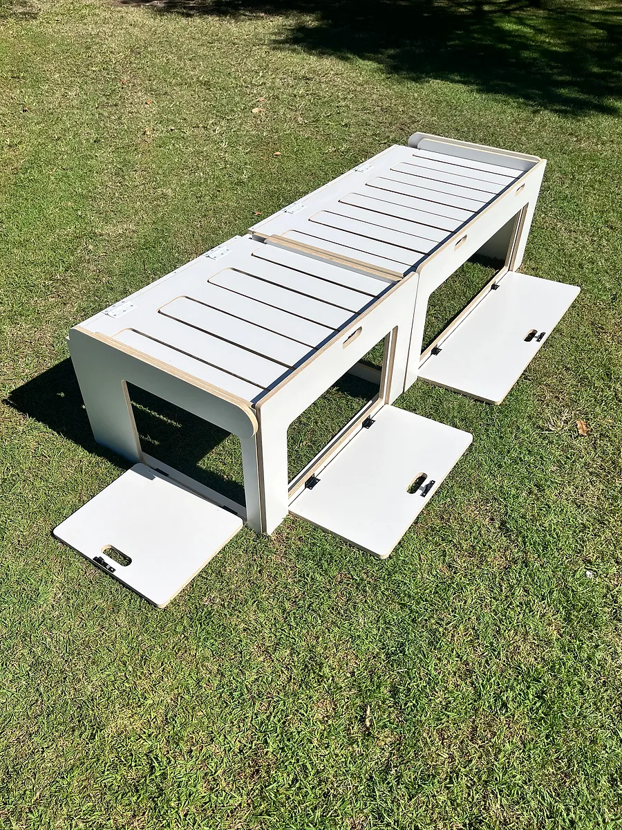 White comb bed stowed — two units side-by-side from above