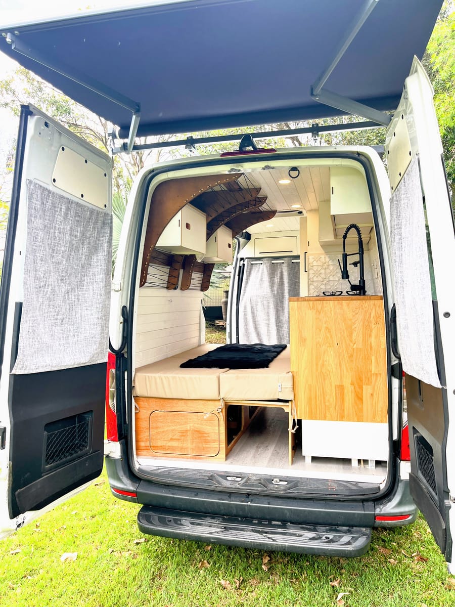 Custom Sprinter fit-out, rear doors open at handover